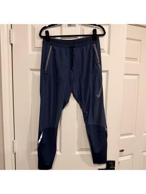 #89 NIKE NIKE SWIFT RUNNING PANTS BV4809-451 OBSIDIAN MENS SIZE MEDIUM